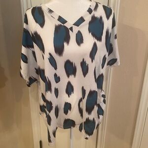 Stylish Women's Top with Blue and White Pattern